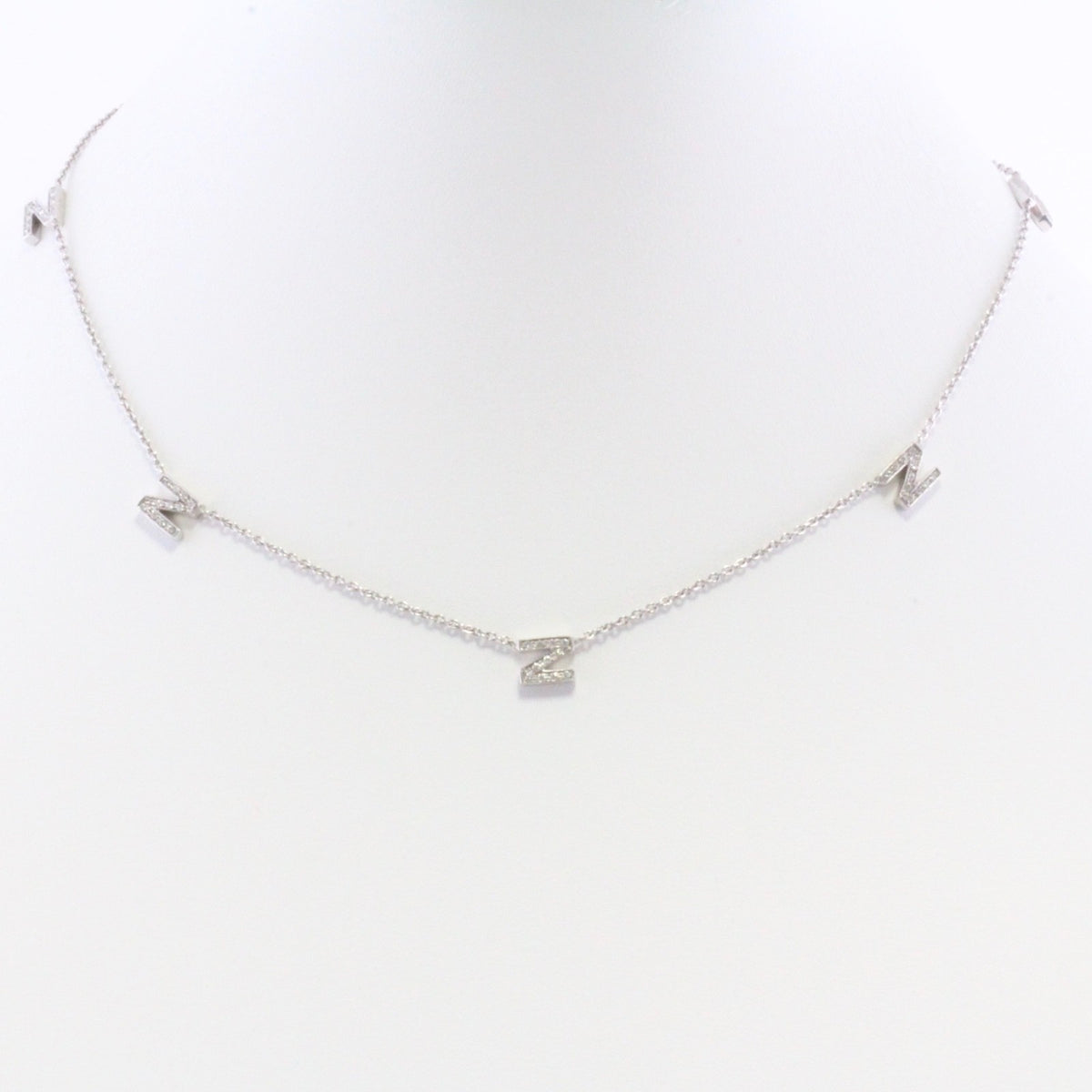 Roberto coin letter "N" diamond necklace and white gold
