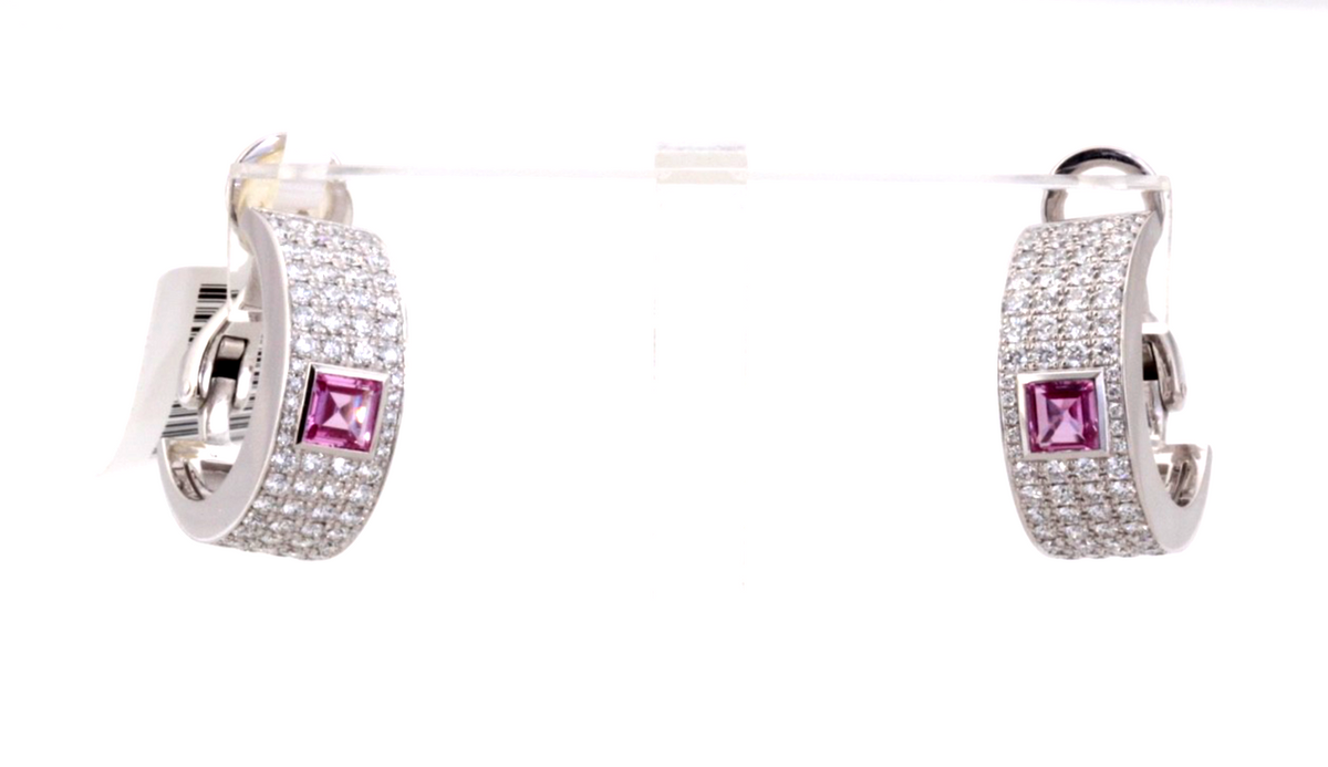 Offered is an authentic pair of Chopard high-jewelry hoop earrings, crafted in 1