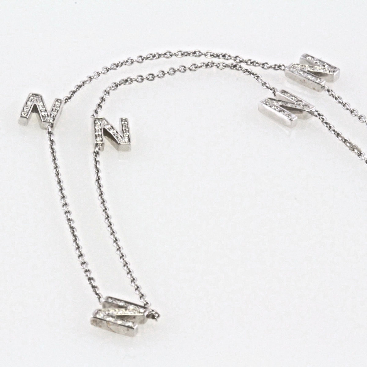 Roberto coin letter "N" diamond necklace and white gold